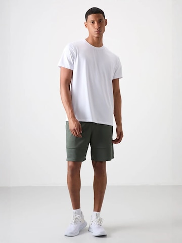 Pantalon de sport Tommy Life en vert