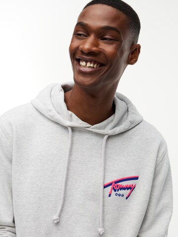 Tommy Jeans Mikina 'NYC SIGNATURE' - Sivá