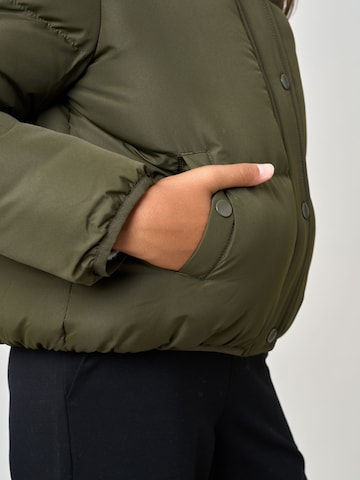 Deeluxe Mantel in Groen