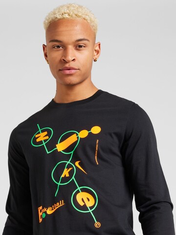 T-Shirt fonctionnel 'SWOOSH' NIKE en noir