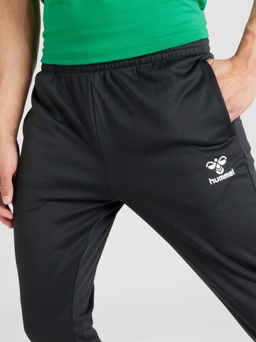 Skinny Pantalon de sport 'Essential' Hummel en noir