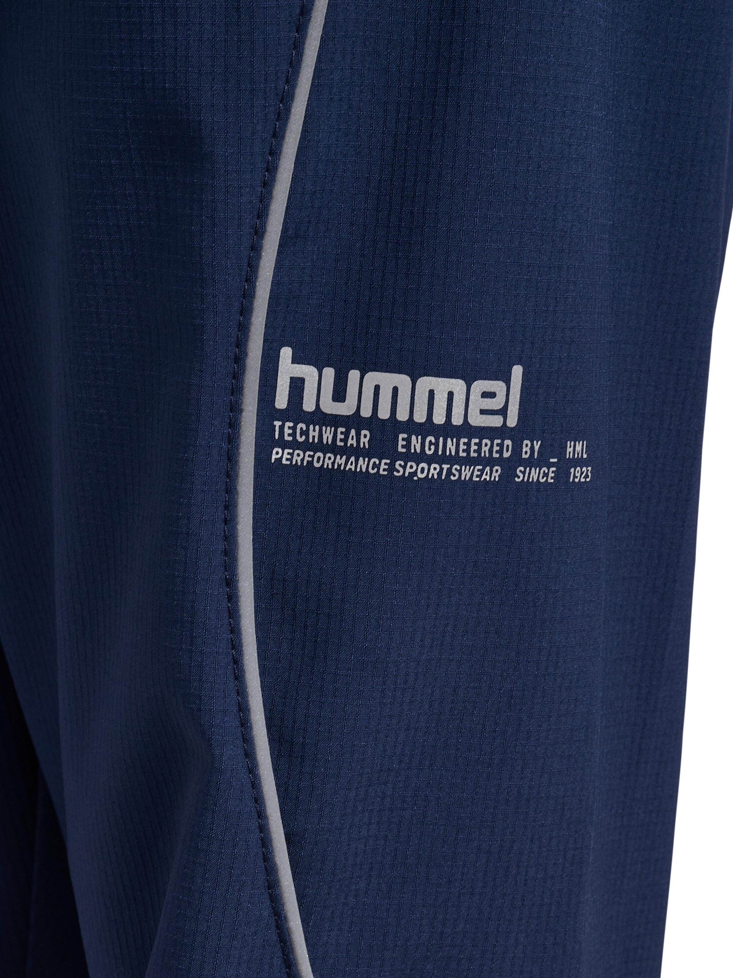 Effilé Pantalon fonctionnel 'JR' Hummel en bleu
