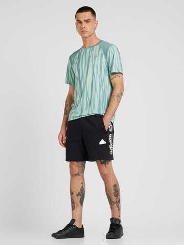 ASICS Koszulka funkcyjna 'ROAD' w kolorze zielony