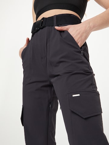 Tapered Pantaloni sport de la aim'n pe negru