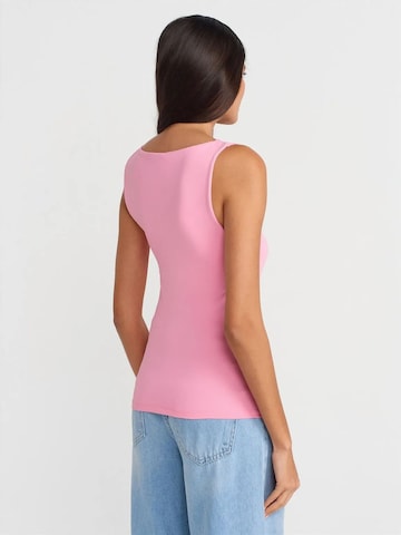Top di Dilvin in rosa