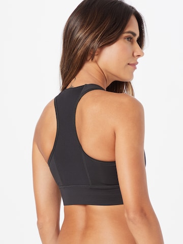 Reebok Bustier Biustonosz sportowy 'Essentials' w kolorze czarny