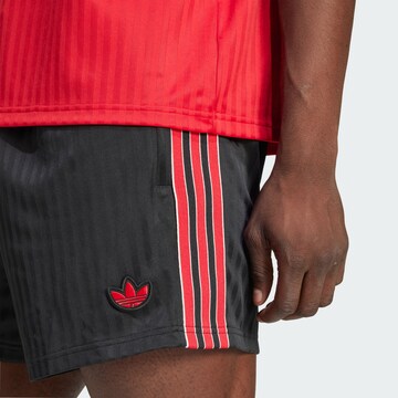 Loosefit Pantalon de sport 'Manchester United Terrace Icons' ADIDAS ORIGINALS en noir