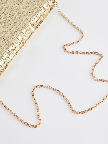 Next Clutch in Gold