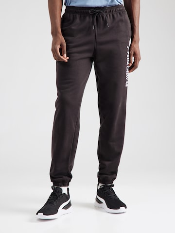 Tapered Pantaloni sport de la PUMA pe negru: față