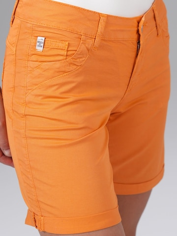 M.O.D MIRACLE OF DENIM Slim fit Trousers in Orange