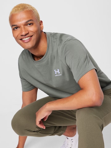 Tricou funcțional de la UNDER ARMOUR pe verde