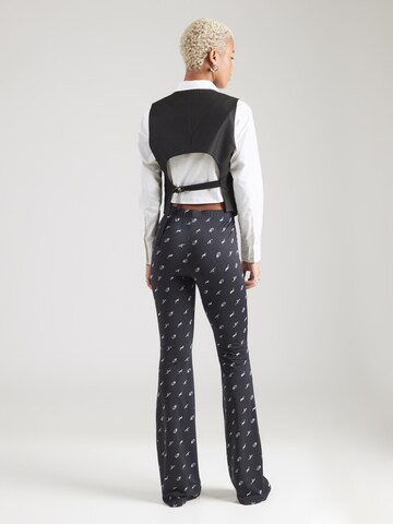 évasé Leggings Moschino Jeans en noir