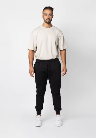 SNOCKS Tapered Jogginghose in Schwarz