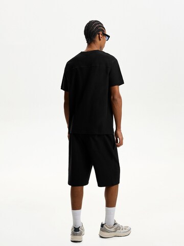 Baggy Pantalon Bershka en noir