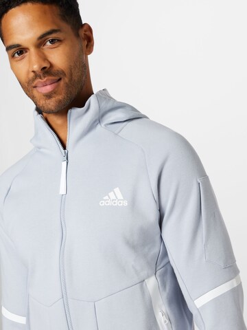 ADIDAS SPORTSWEAR - Casaco de treino em moletão 'Designed For Gameday ' em cinzento