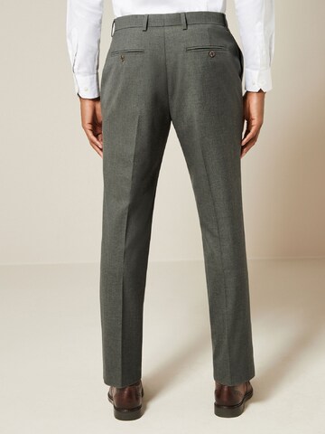 Coupe slim Pantalon chino 'Motion Flex' Next en vert