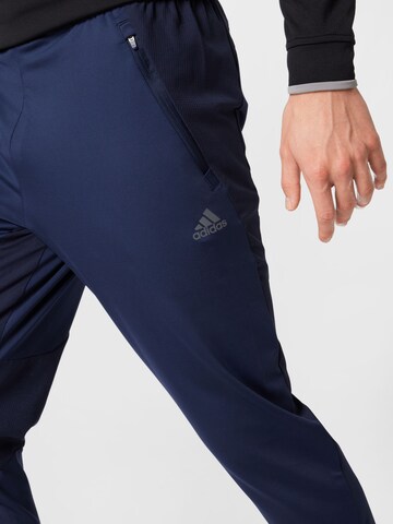 ADIDAS SPORTSWEAR Úzky strih Športové nohavice 'Hiit ' - Modrá
