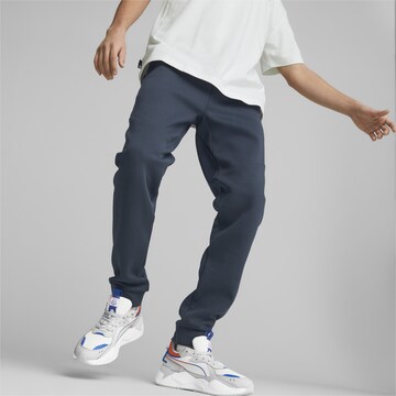 PUMA Tapered Pants in Blue: front