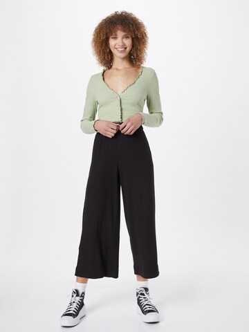 Wide leg Pantaloni di Monki in nero