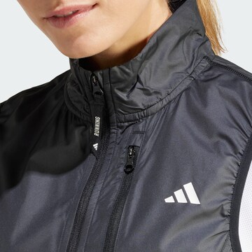 Gilet de sport 'Own the Run' ADIDAS PERFORMANCE en noir