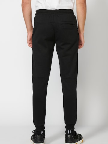 KOROSHI Normální Kalhoty – černá