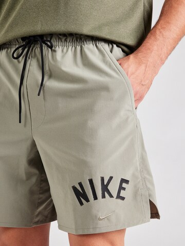 NIKE Regular Sportshorts 'UNLMTD SWOOSH' in Grau