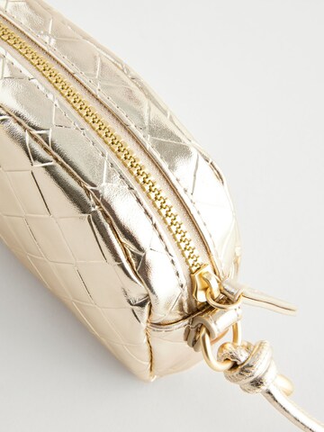 Next Tas in Goud