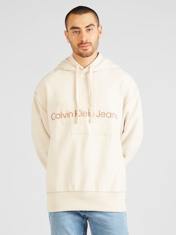 Sweat-shirt Calvin Klein Jeans en beige : devant