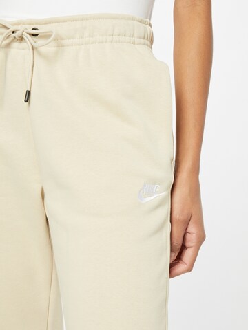 Nike Sportswear Дънки Tapered Leg Панталон в бежово