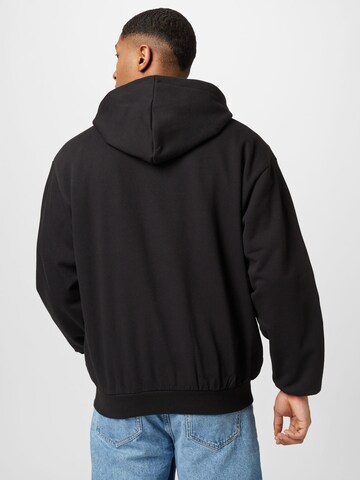 Karl Kani Zip-Up Hoodie in Black