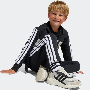 ADIDAS SPORTSWEAR Tracksuit 'Essentials Tiberio' in Black