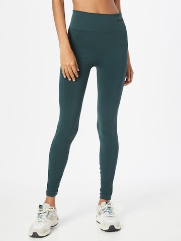 Hummel Skinny Sportbroek in Groen: voorkant