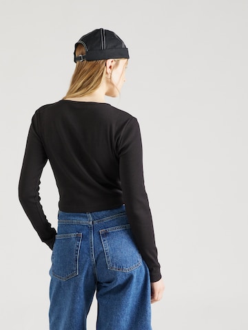 Geacă tricotată de la Calvin Klein Jeans pe negru