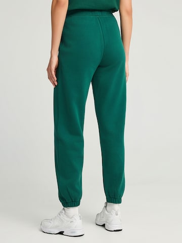 Regular Pantalon de sport Funky Buddha en vert