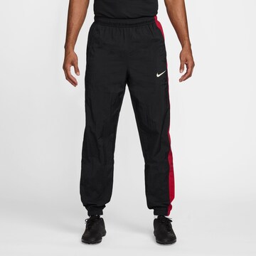 NIKE Tapered Workout Pants 'Total 90' in Black: front