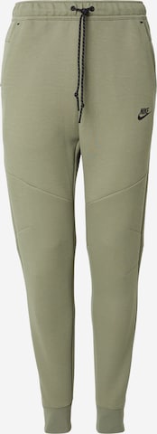 Nike SportswearTapered Hlače 'TCH FLC' - zelena boja: prednji dio