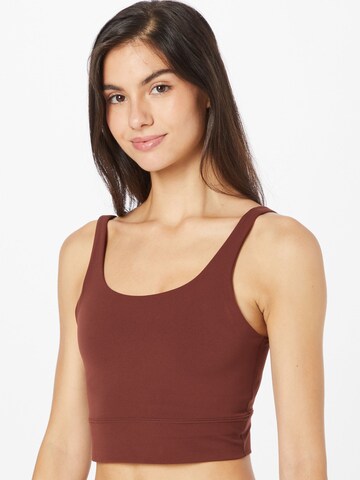 NIKE Regular Sports bra 'Luxe' in Brown: front