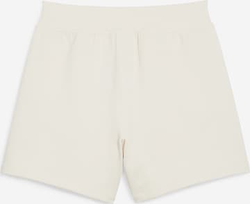 PUMA Regular Trousers 'DARE TO MUTED MOTION' in Beige