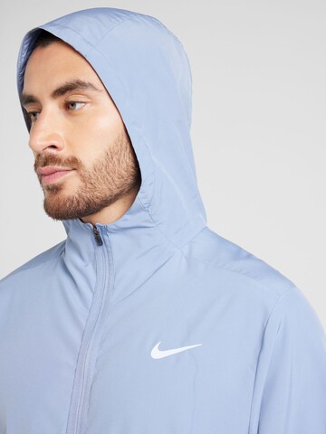 NIKE Training Jacket 'Form' in Blue