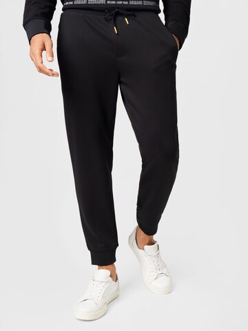ARMANI EXCHANGE Tapered Trousers in Black: front
