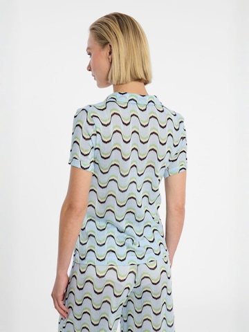 Haut 'Dulya' Ana Alcazar en bleu