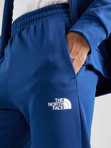 zils THE NORTH FACE Pakapēniski sašaurināts piegriezums Āra bikses 'REAXION 2.0'