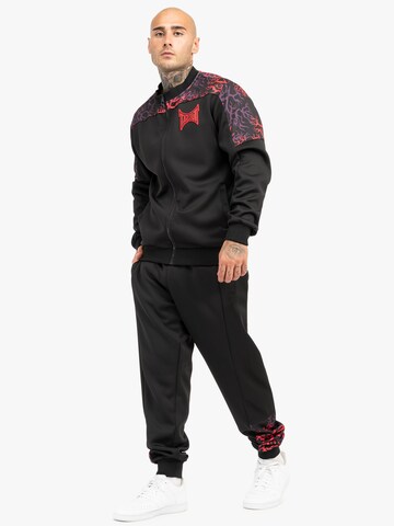 Tapout Strój treningowy ' ROOTS TAPTRACK ' w kolorze czarny: przód