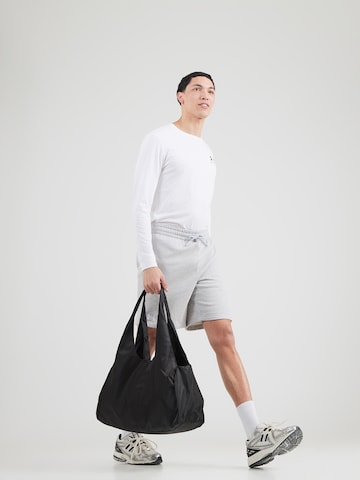 UNDER ARMOUR Regular Workout Pants in Grey