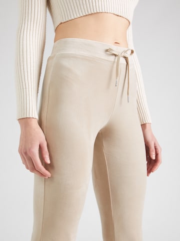 Gina Tricot Flared Pants in Beige