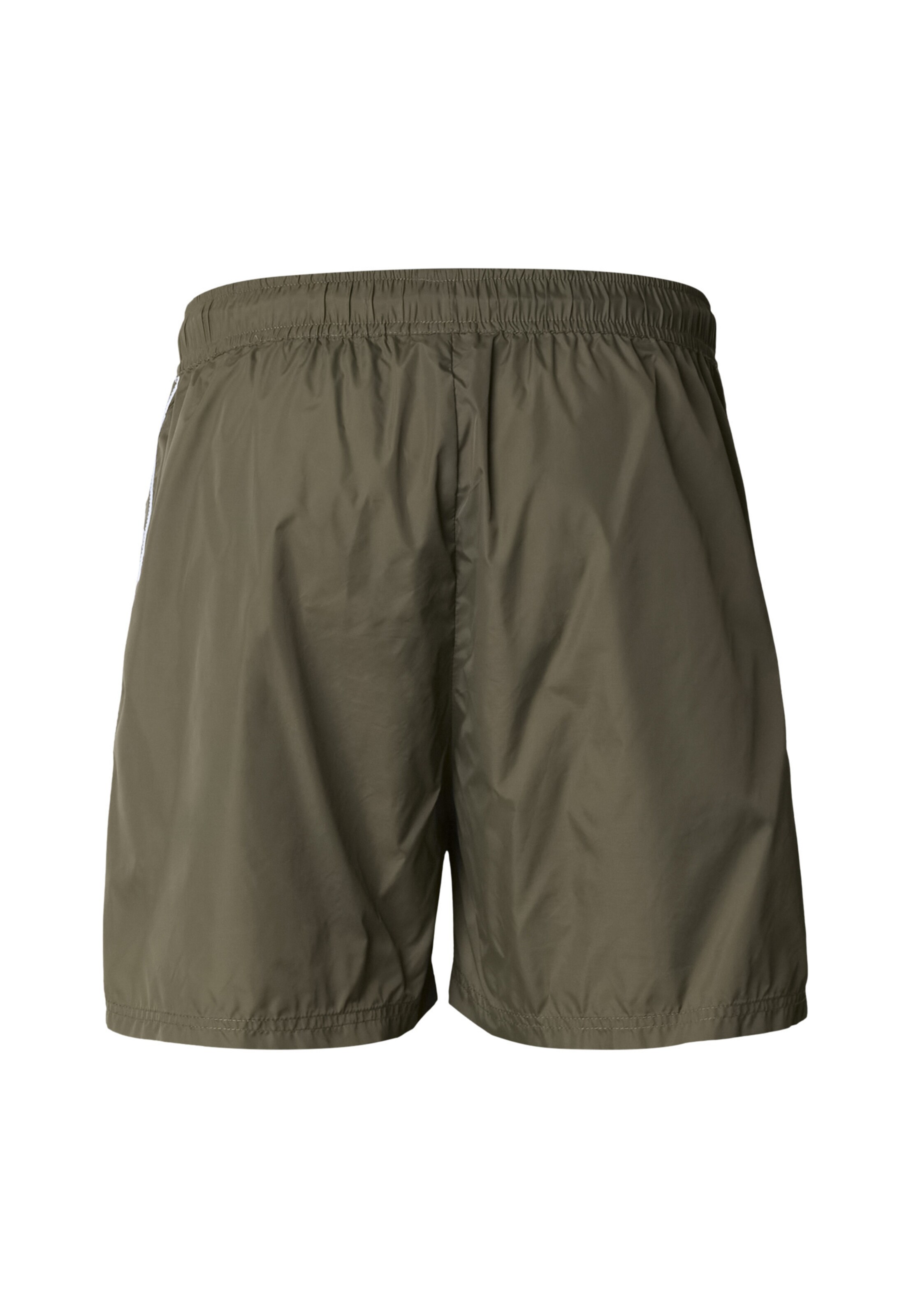 Loosefit Pantaloni di Unfair Athletics in verde