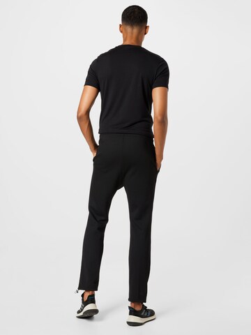 Regular Pantalon de sport Reebok en noir