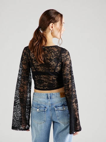 Monki - Blusa en negro