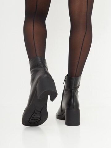 CESARE GASPARI Booties in Black