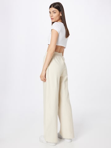 Wide leg Pantaloni di Urban Classics in beige